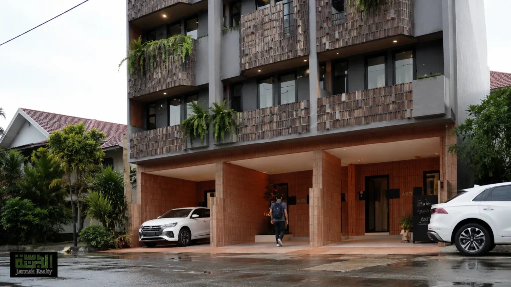 Penghuni memasuki area akses Kahfi Apartkos sebagai rumah kos modern dekat UI Depok.